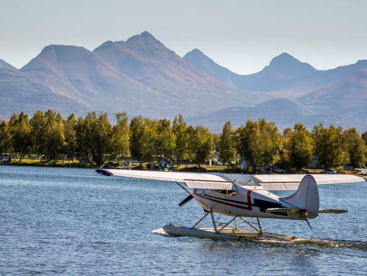 Seaplane take-off from Lake Hood Seaplane Base in Anchorage, Alaska; Shutterstock ID 481250239; Invoice Number: -