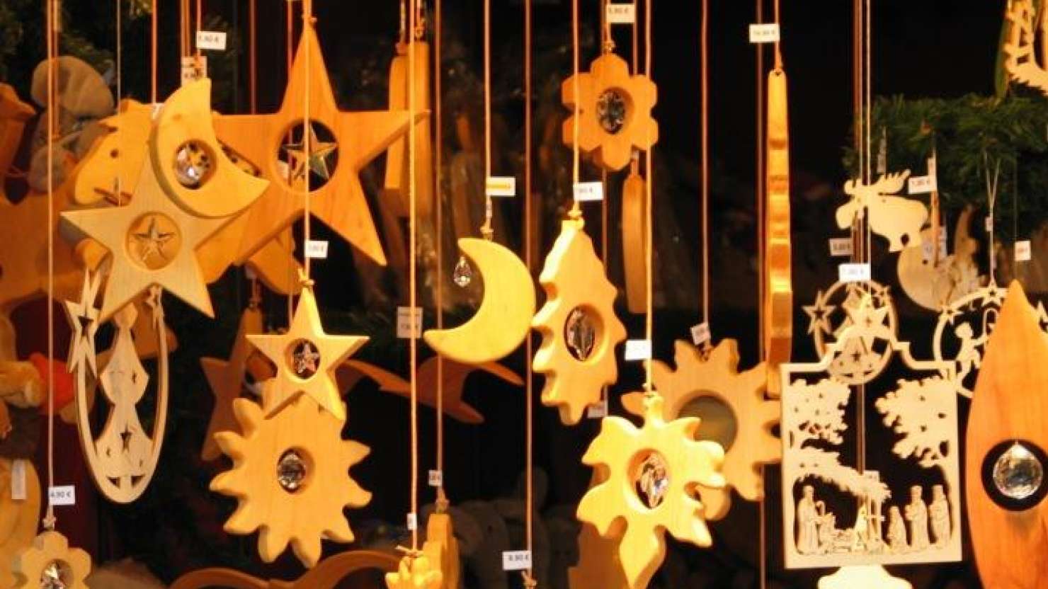 Handmade wooden decorations for sale at a Hamburg Christmas market