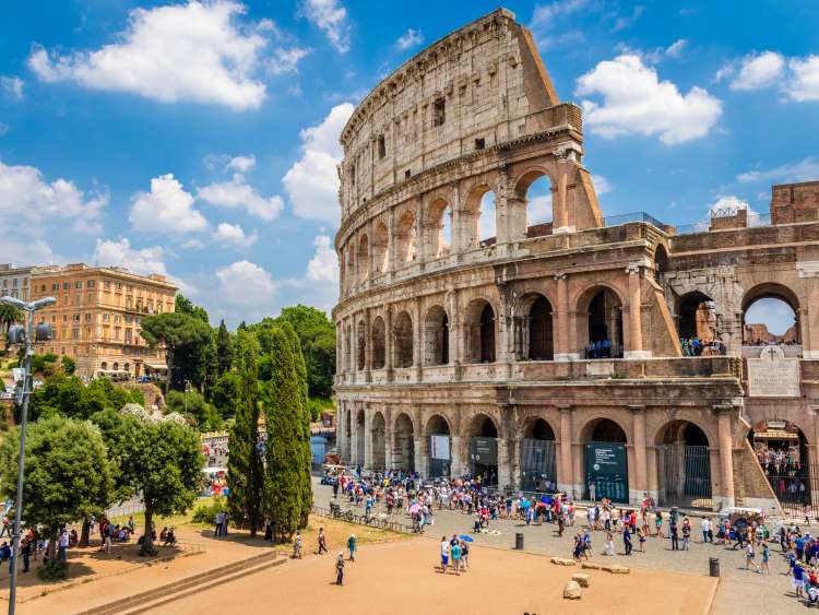 Colosseum with clear blue sky, Rome, Italy. Rome landmark and antique architecture. Rome Colosseum is one of the best known monuments of Rome and Italy; Shutterstock ID 386673757; Invoice Number: -