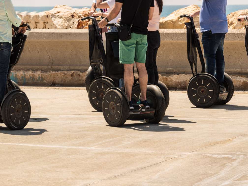 A group of people are riding on electric scooter ; Shutterstock ID 645619510; Invoice Number: -