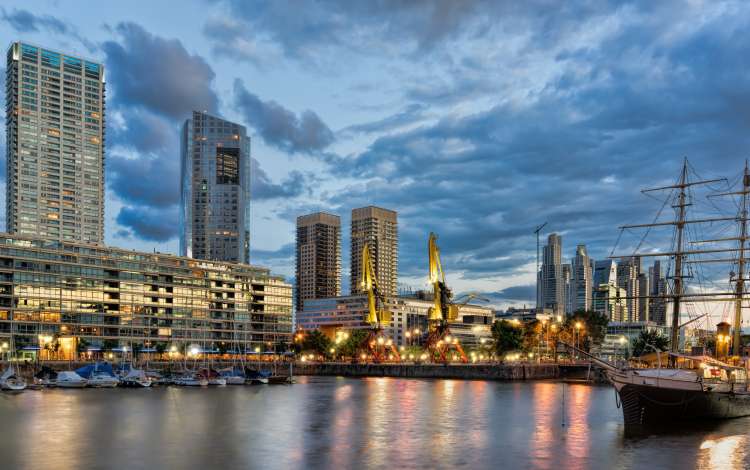 Skyscrapers in Buenos Aires harbour at sunset