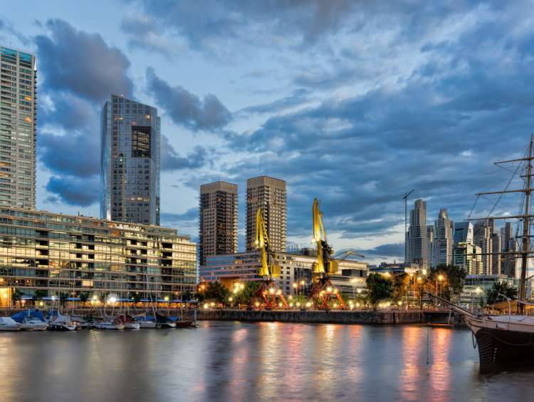 Skyscrapers in Buenos Aires harbour at sunset