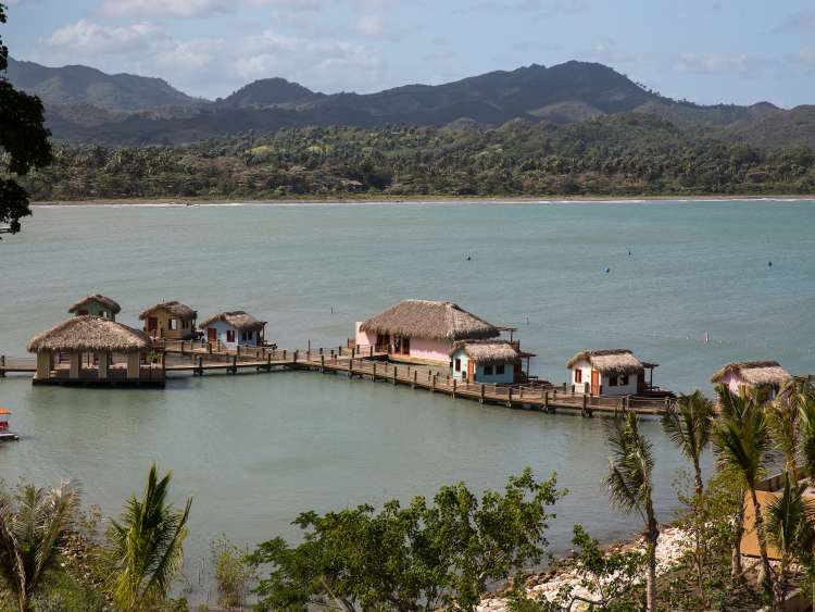 Thatched houses over the water near Amber Cove, Dominican Republic