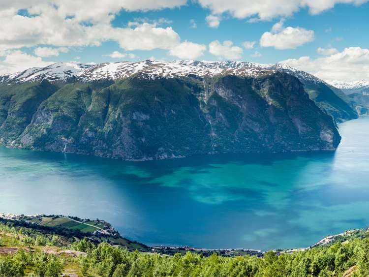 Panoramic view of magnificent  inner Aurlandsfjord in Norway at early summer with snow still resting at the mountain summits; Shutterstock ID 206380591; Invoice Number: -