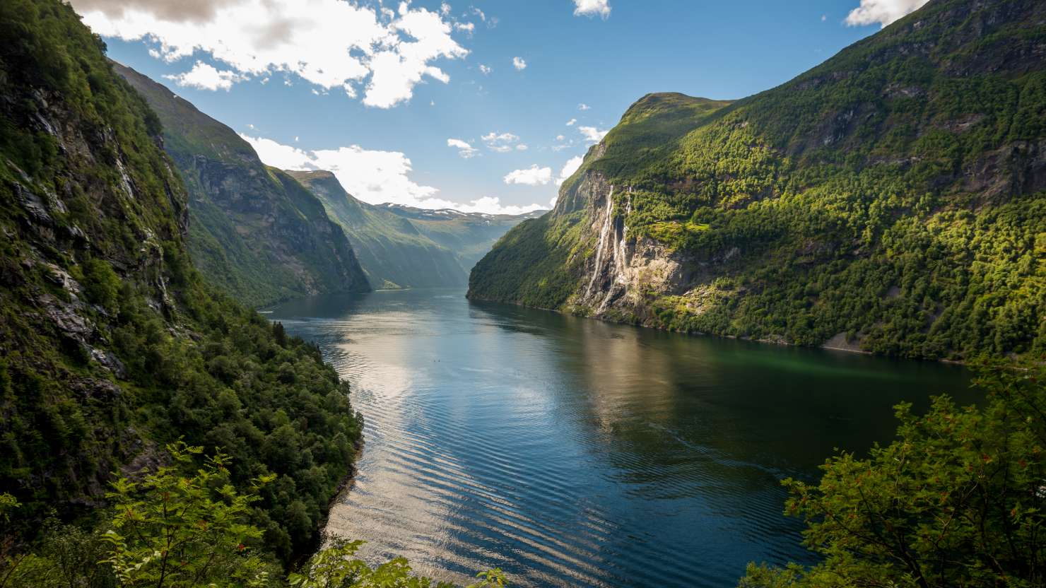 Just one of the many waterfalls seen along Geirangerfjord, on a summer's day.