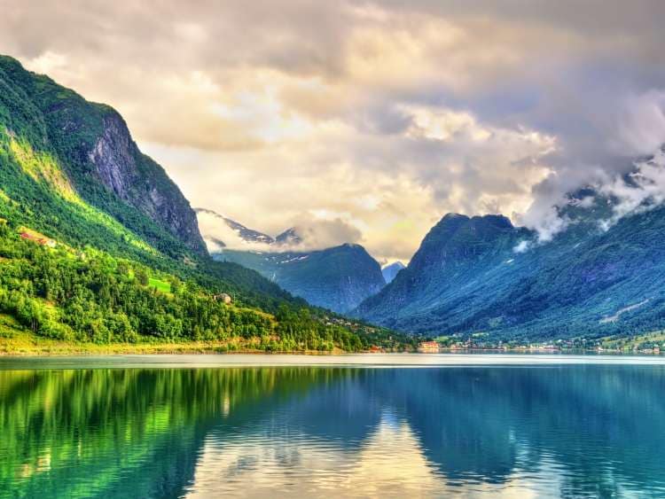 The forested slopes and silver waters of Innvikfjorden, Mother Nature’s Wonderland