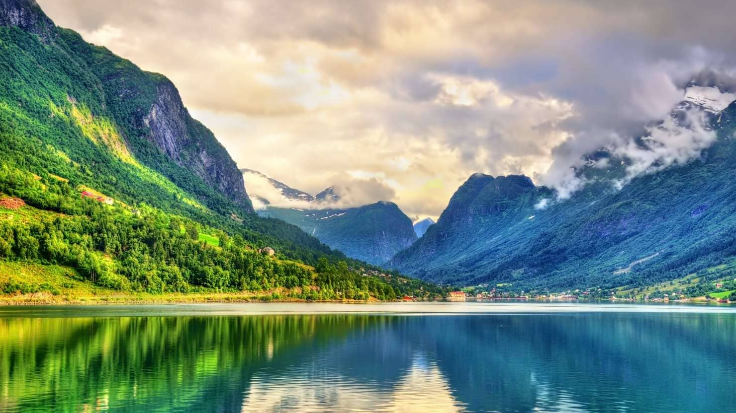 The forested slopes and silver waters of Innvikfjorden, Mother Nature’s Wonderland