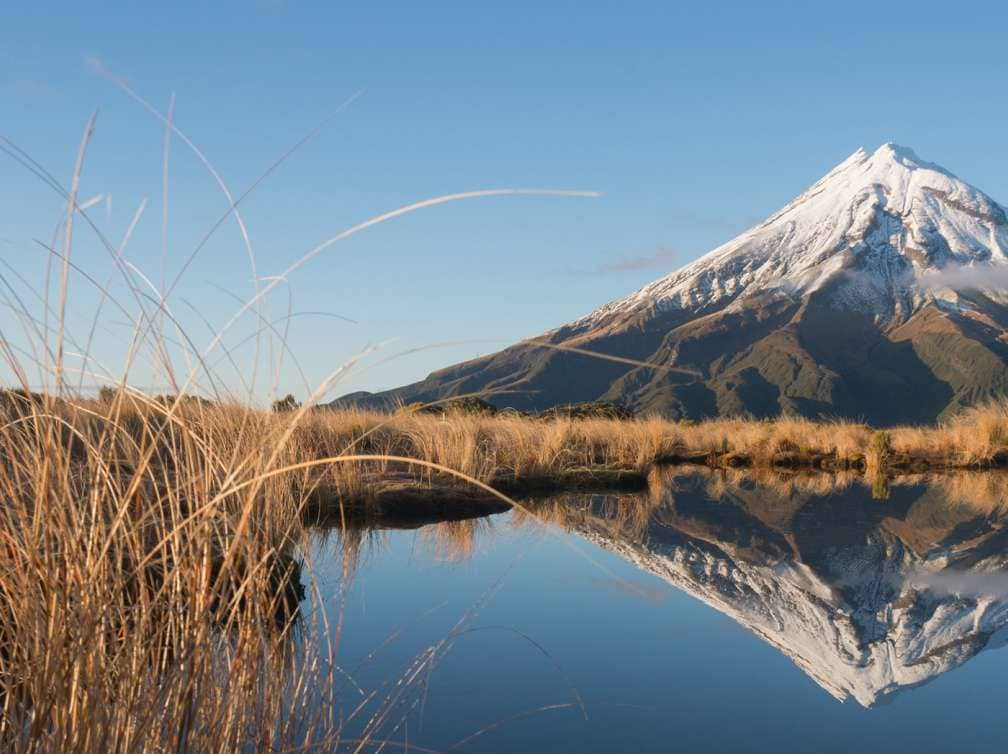 Beautiful reflection mountain and blue lake, Taranaki, New Zealand; Shutterstock ID 650189554; Purchase Order: -