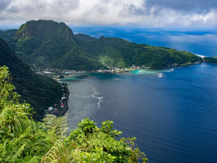 Aerial View of the village of Aua and Rainmaker Mountain on Tutuila; Shutterstock ID 427032988