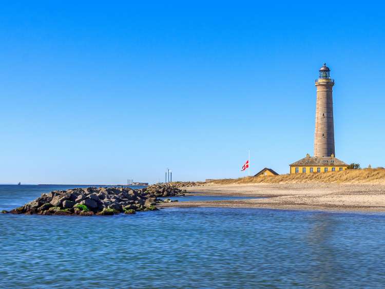 The Grey Lighthouse on the shores of Skagen, Denmark