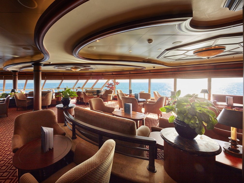 The Commodore Club on board Cunard's Queen Elizabeth showing seating areas and sea views