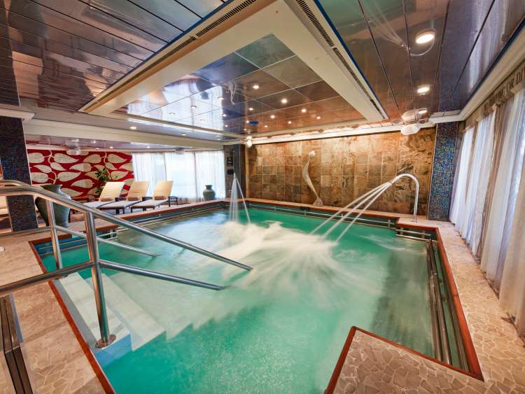 The main pool, with jets and sea views, in the Mareel Spa on board Cunard's Queen Victoria