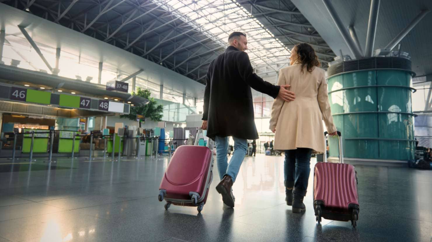 Couple with suitcases