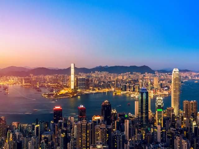 Sunset in Victoria harbour Hong Kong lookout from The Peak; Shutterstock ID 563792680