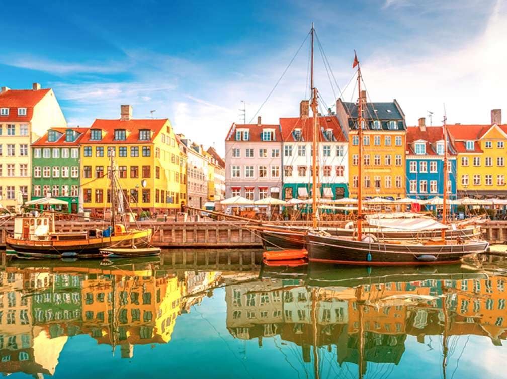 Boats line the quayside in Nyhavn, old town, Copenhagen