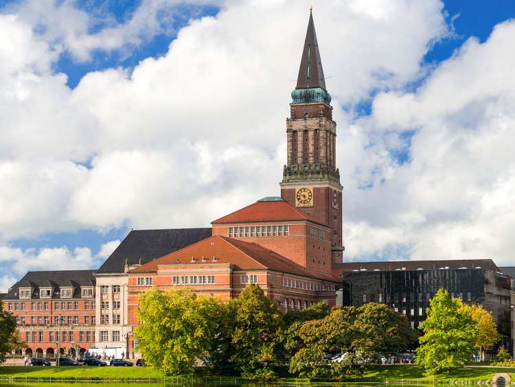 Kiel Town Hall during the day with reflection in the lake near by