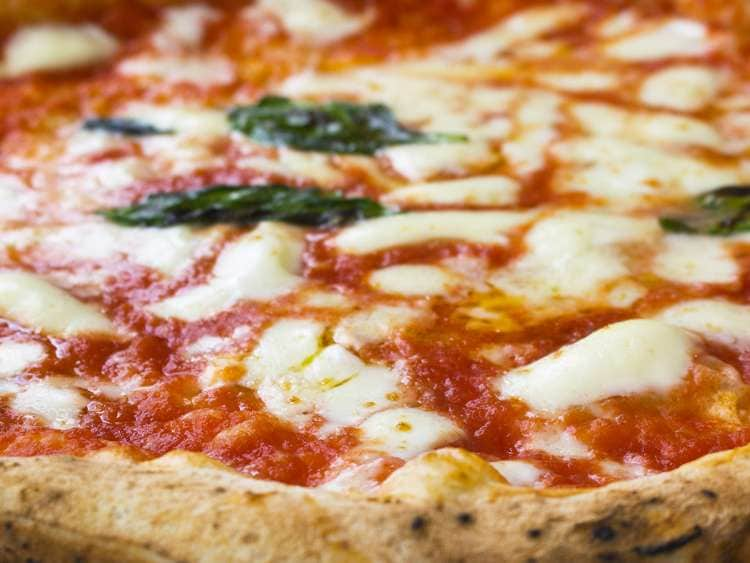 Margherita pizza with bubbling mozzarella and fresh basil