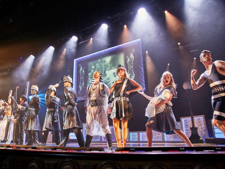 Actors on stage in the Royal Court Theatre