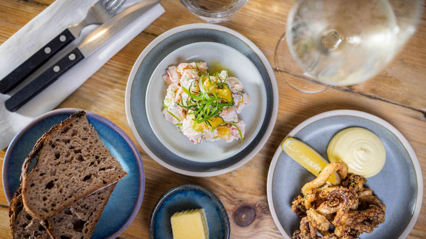 A selection of seafood dishes prepared by Nathan Outlaw