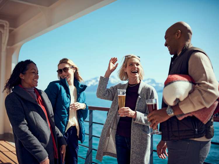 Guests on board Queen Elizabeth in Alaska