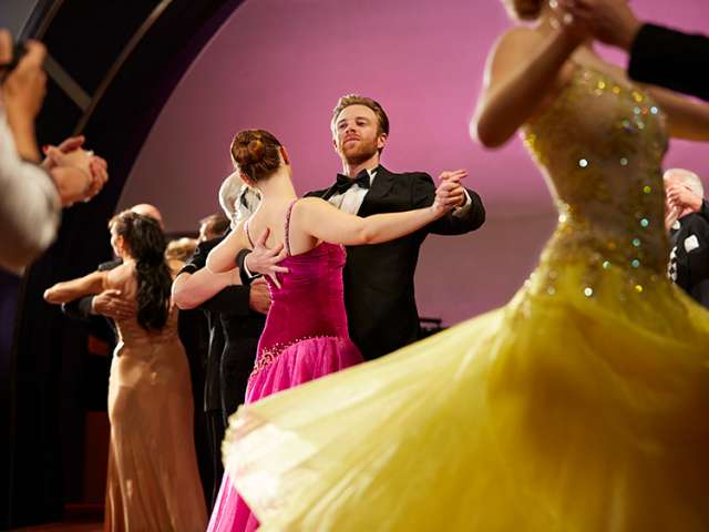 Couple ballroom dancing at a Gala Evening on board a Cunard cruise ship