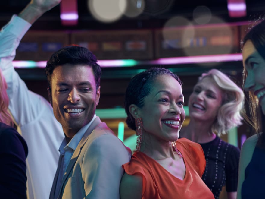 Group of people dancing in Queen Elizabeth's Yacht Club