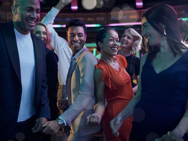 Group of people dancing in Queen Elizabeth's Yacht Club