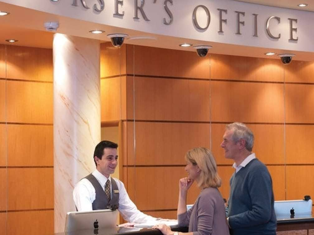 Purser's Desk on board Cunard cruise ship Queen Mary 2 