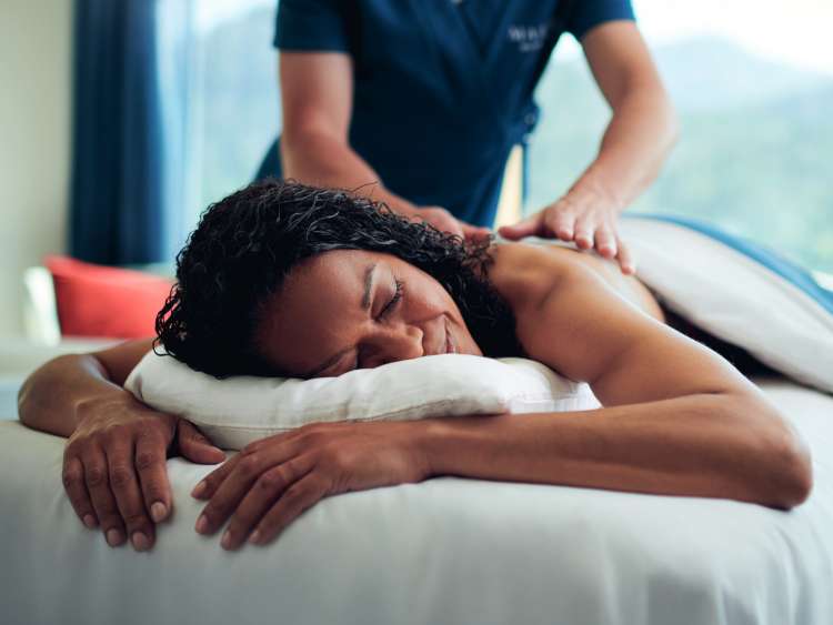 Guest enjoying massage treatment in the Mareel spa