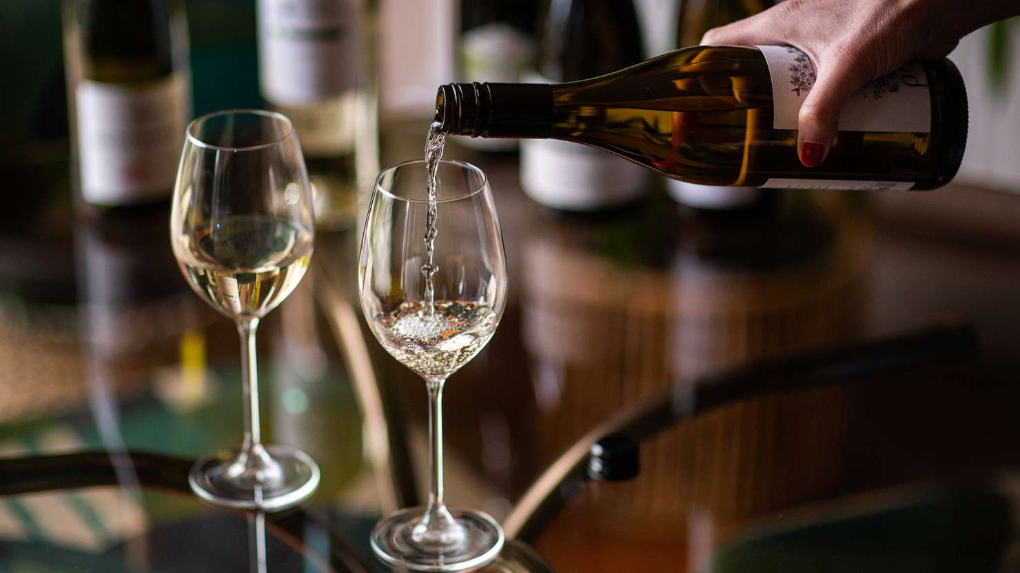 Wine being poured into glass