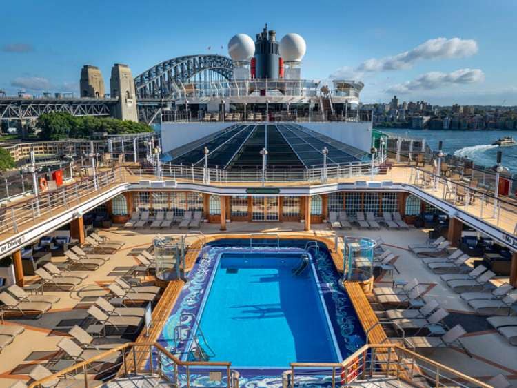 The Pavilion pool area and outdoor lounge on board Cunard cruise ship Queen Elizabeth 