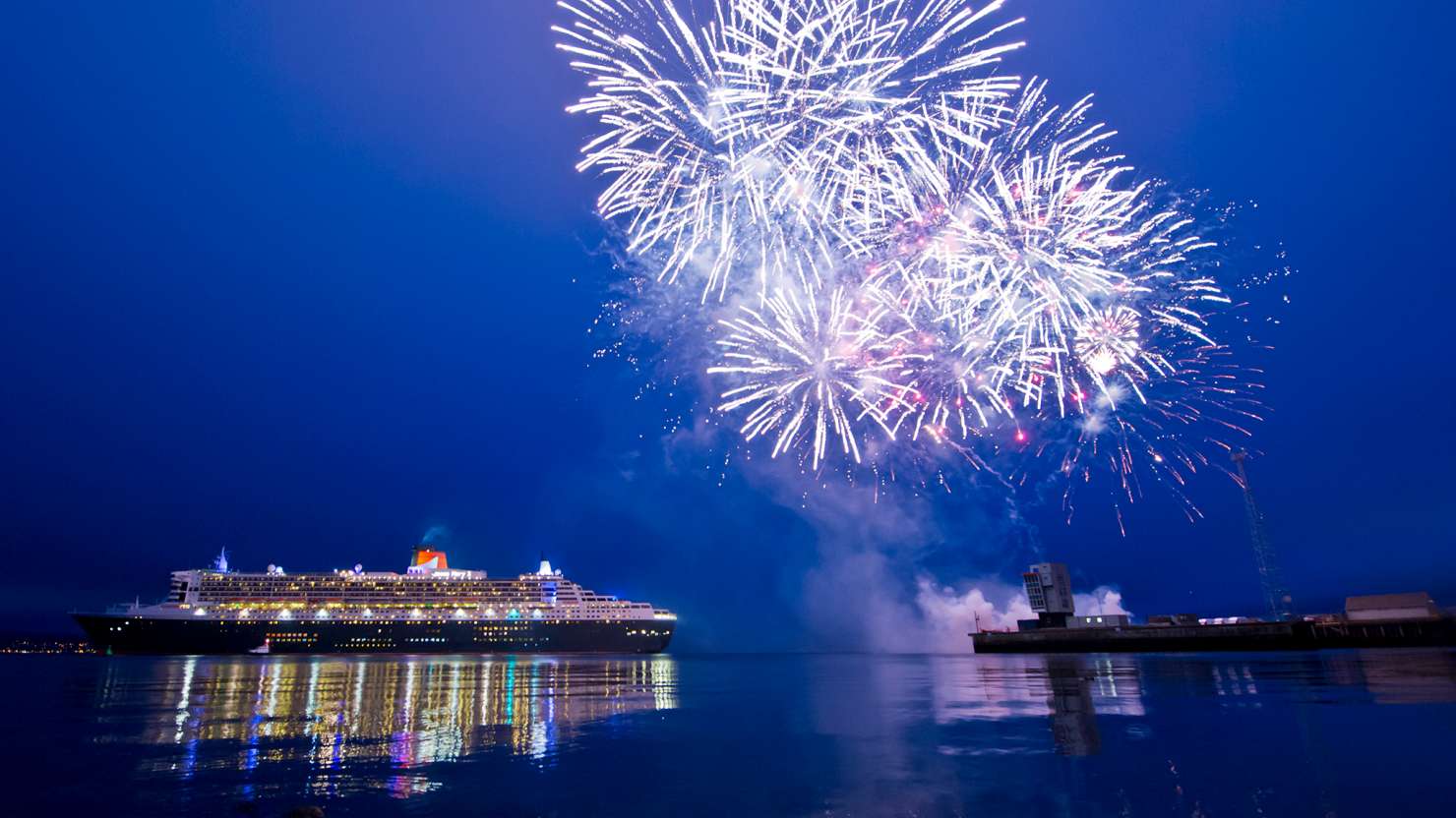 The visit to Greenock by Queen Mary 2, the biggest ocean liner in the world, on Thursday 21 May 2015 to mark the long and historic link between Cunard and the Clyde as part of the company’s 175th anniversary celebrations, culminated in a fusillade of fireworks exploding over the flagship as she sail at 2200hrs this evening. 

Over the company's 175 years, 248 ships have flown the Cunard flag and of those 125 were constructed in Scotland with 120 of those being built on the Clyde.  Indeed, Cunard’s first 75 ships were built in Scotland.  The Clyde has produced some of the most famous ships ever to go to sea, including  Lusitania, Aquitania, Queen Mary, Queen Elizabeth, Caronia and Queen Elizabeth 2. 