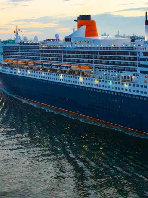 Cunard cruise ship Queen Mary 2 sailing away