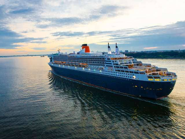 Cunard cruise ship Queen Mary 2 sailing away