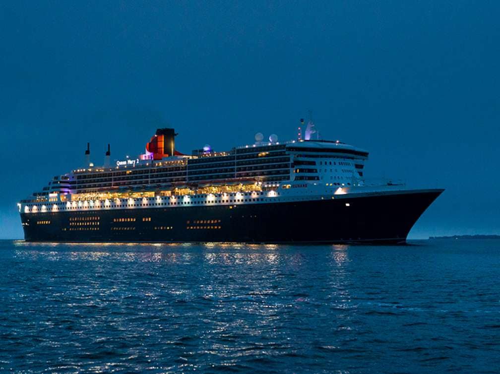 QM2 in Southampton Water in the evening