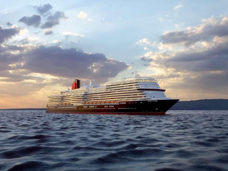 Cunard's Queen Anne sailing at sunset