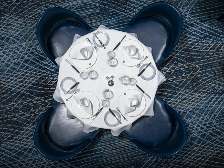 Top-down view of a table for four in Queen Anne's Britannia restaurant