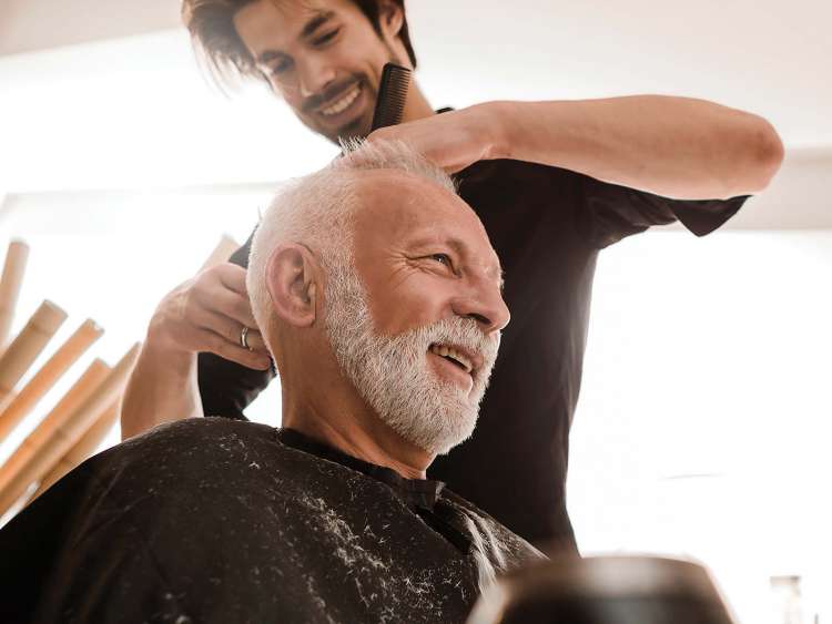 senior man visiting barber shop